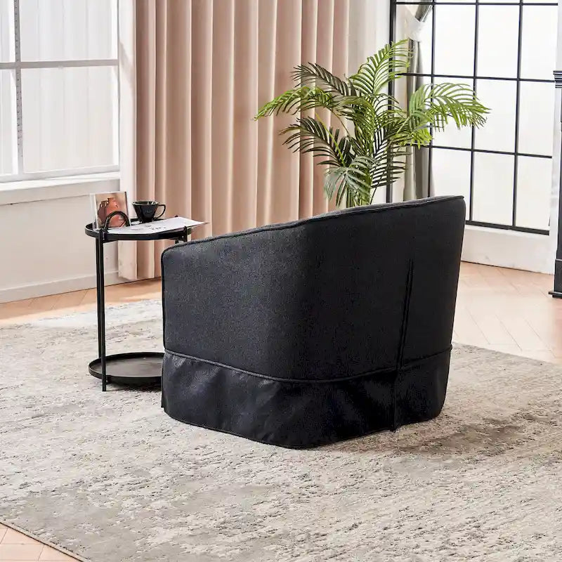 Poltrona a botte girevole in lino arancione/nero con pouf, 1 posto